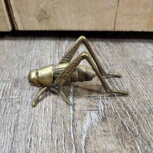 brass grasshopper/crickett